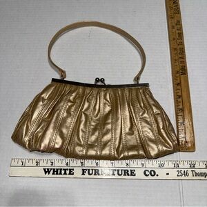 Bijoux Terner Gold Clutch with Pleated Design